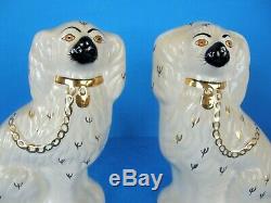 A Pair Of Beswick England Antique Staffordshire Dog Ceramic Statues-signed