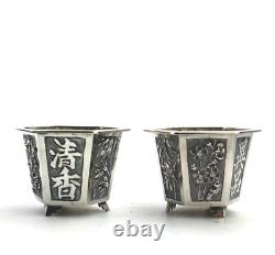 A good pair antique Chinese solid silver novelty Wang Hing Salts & liners C. 1900