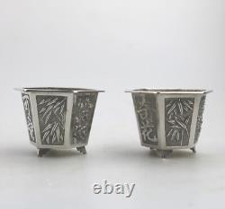 A good pair antique Chinese solid silver novelty Wang Hing Salts & liners C. 1900