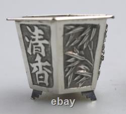 A good pair antique Chinese solid silver novelty Wang Hing Salts & liners C. 1900
