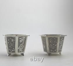 A good pair antique Chinese solid silver novelty Wang Hing Salts & liners C. 1900