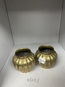 A pair of antique chinese brass ribbed, signed vases