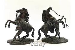 A pair of bronze marley Horses over signed Coustou circa 1900