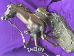 A pair of bronze marley Horses over signed Coustou circa 1900