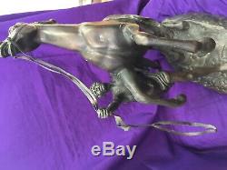 A pair of bronze marley Horses over signed Coustou circa 1900