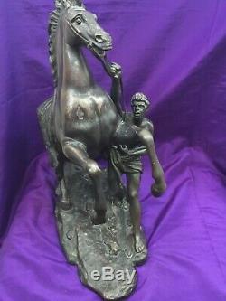 A pair of bronze marley Horses over signed Coustou circa 1900