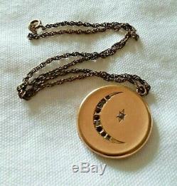 ANTIQUE SIGNED CRESCENT MOON GF LOCKET with PHOTOS OF BLACK AFRICAN COUPLE