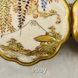 Antique Meiji-period Japanese Satsuma Wisteria & Mt Fuji buckle pair signed