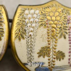 Antique Meiji-period Japanese Satsuma painted Wisteria floral buckle pair signed