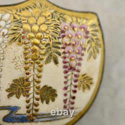 Antique Meiji-period Japanese Satsuma painted Wisteria floral buckle pair signed