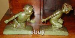 Antique pair Signed E. Barrett Parsons bronze children bookends-15874