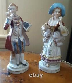 Antique porcelain pair man and woman. Hand painted Marked and signed