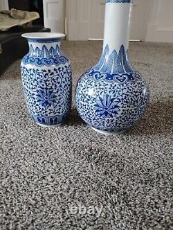 Chinese antique porcelain pair vases. Blue and white signed. Floral design