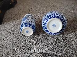 Chinese antique porcelain pair vases. Blue and white signed. Floral design