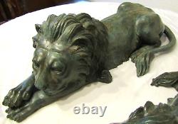 Mirrored Pair of Antique Signed A. Tiot French Bronze Recumbent Lion Sculptures