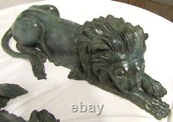 Mirrored Pair of Antique Signed A. Tiot French Bronze Recumbent Lion Sculptures