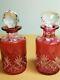 Pair Of Antique Baccarat Perfume Bottles Cranberry Cut To Clear Signed