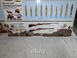Pair Of Vintage Winchester Western Sportsman's Game Guide Sign Rifle & Shotgun