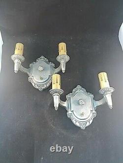 Pair of 1930s Signed Riddle Co. Cast Metal Wall Sconces