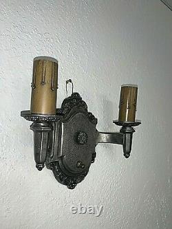 Pair of 1930s Signed Riddle Co. Cast Metal Wall Sconces