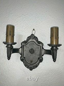 Pair of 1930s Signed Riddle Co. Cast Metal Wall Sconces