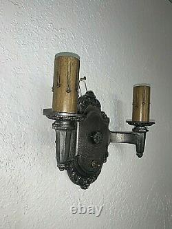 Pair of 1930s Signed Riddle Co. Cast Metal Wall Sconces