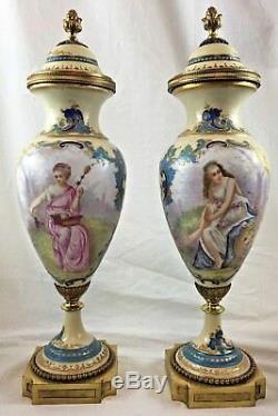 Pair of 19th Century Sevres Porcelain Urns with Women and Cherubs Signed, French