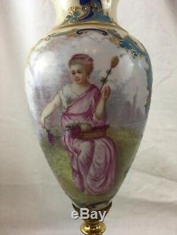 Pair of 19th Century Sevres Porcelain Urns with Women and Cherubs Signed, French