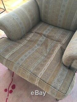 Pair of George Smith armchairs with casters pattern fabric signed cushion seat