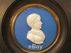 Pair of Georgian signed porcelain silhouette cameo portrait plaques dated 1817