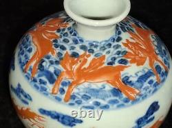 Pair of Qing Dynasty Underglaze Blue & Iron Red Dragon & Phoenix Vases with Deer