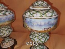 Pair of Sevres Lidded urns Hand painted, artist signed