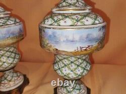 Pair of Sevres Lidded urns Hand painted, artist signed