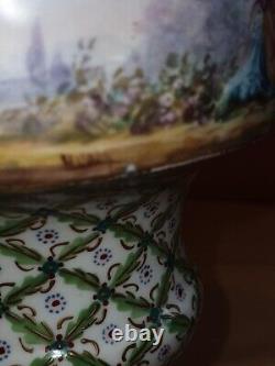 Pair of Sevres Lidded urns Hand painted, artist signed