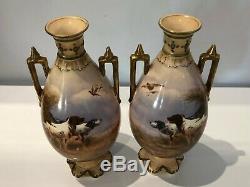 Pair of antique Crown Devon hand painted gilt handles vases, signed by R. Hinton