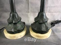 Pair of bronze laps signed by Giacometti