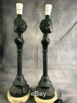 Pair of bronze laps signed by Giacometti