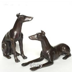 Pair of signed bronze greyhound dogs