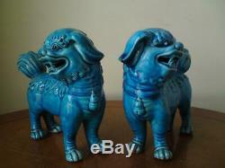 Pair signed Chinese monochrome blue turquoise glazed lion dog standing figurine